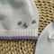 CAPPELLO E BAVETTA LR1006 B.CO/LILLA LA SARTORIA DEI PICCOLI 